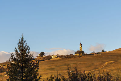 View of temple against clear blue sky