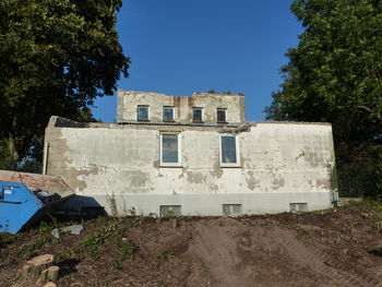 Abandoned built structure against clear sky