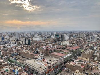 High angle view of buildings against sky during sunset