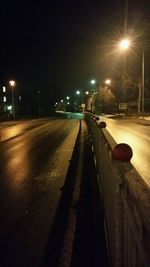 Illuminated street lights at night