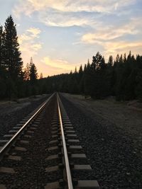 View of railway tracks at sunset
