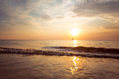 Scenic view of sea against sky during sunset