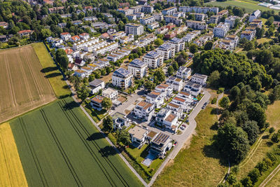 Germany, baden-wurttemberg, ludwigsburg, aerial view of rural suburb with modern energy efficient houses