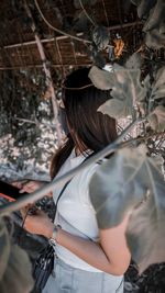 High angle view of woman standing outdoors