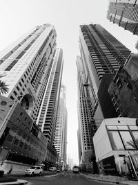 Modern buildings in city against sky