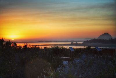 Scenic view of sea against sky during sunset