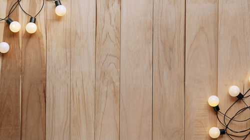 High angle view of balls on wooden table