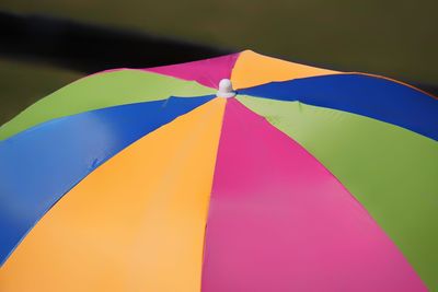 Full frame shot of top of a colorful umbrella in the sun