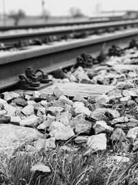 Close-up of railroad track against sky