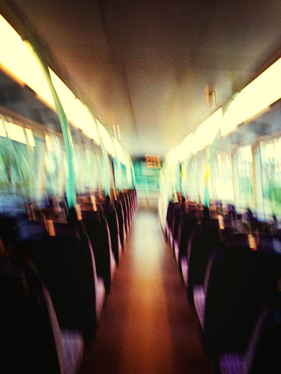 indoors, ceiling, in a row, illuminated, diminishing perspective, the way forward, empty, corridor, lighting equipment, repetition, absence, flooring, multi colored, large group of objects, arrangement, modern, no people, order, selective focus, vanishing point