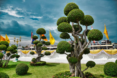 Panoramic view of trees in garden against sky