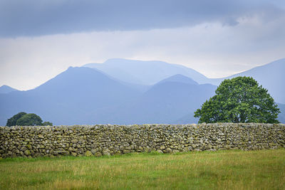Dry stone wall with the hill of the lake district in the background