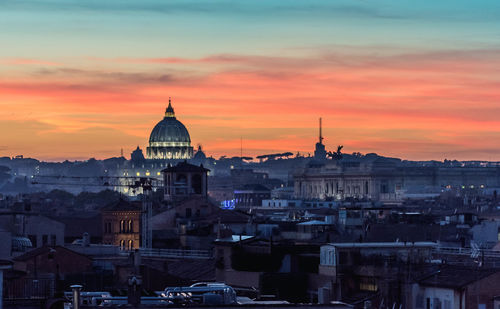 Cityscape against sky during sunset