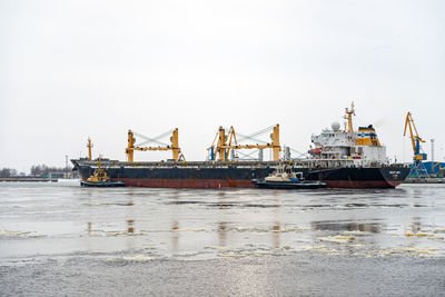 View of ship in sea against sky