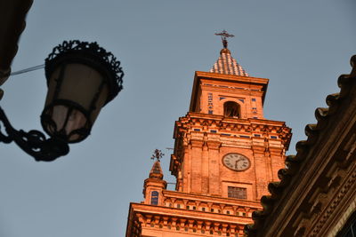 Low angle view of a street lamp and the tower