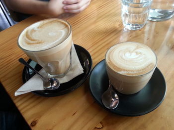 Close-up of latte served on table