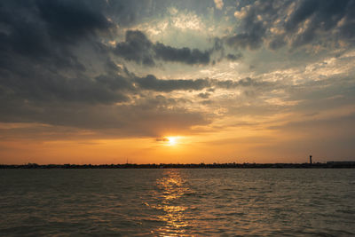 Scenic view of sea against sky during sunset