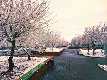 Scenic view of lake against sky during winter