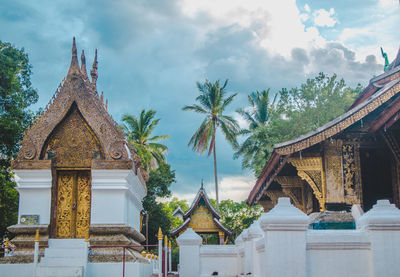 Panoramic view of temple and building against sky