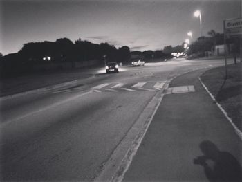 Cars on road at night