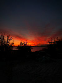 Scenic view of dramatic sky during sunset