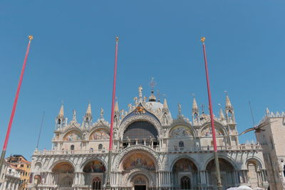 Low angle view of building against blue sky