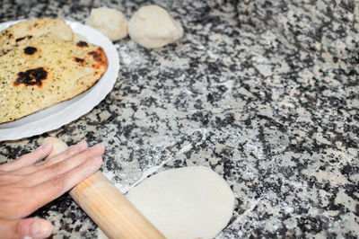 High angle view of person preparing food