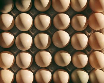 Full frame shot of flat of eggs