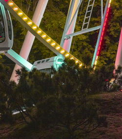 Low angle view of illuminated street light at night