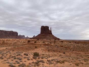 Rock formations on landscape against sky