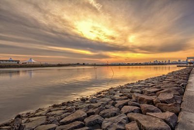 Scenic view of sea against cloudy sky