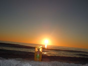 Scenic view of sea at sunset