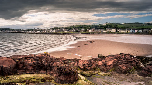 Scenic view of beach against sky