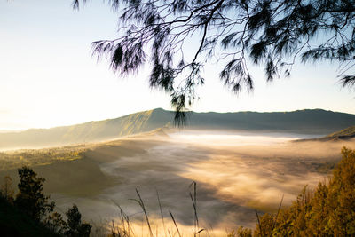 Scenic view of mountains against sky during sunset