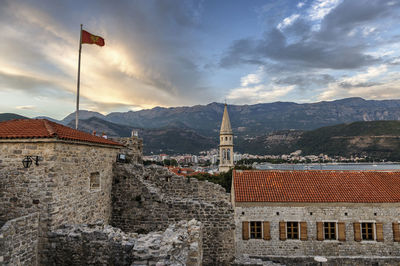 Buildings in city against sky