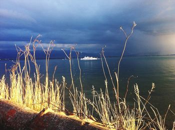 Scenic view of sea against cloudy sky