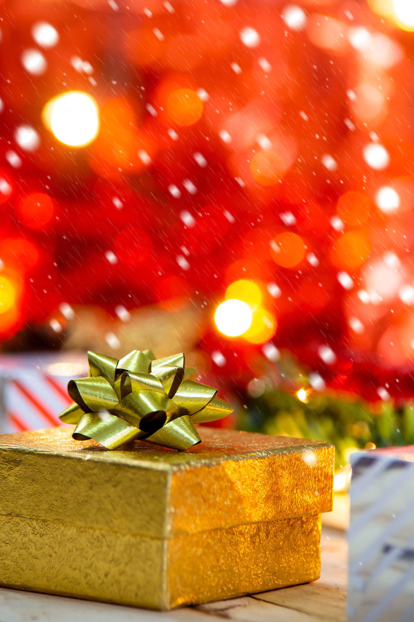 CLOSE-UP OF CHRISTMAS TREE ON TABLE DURING RAINY SEASON