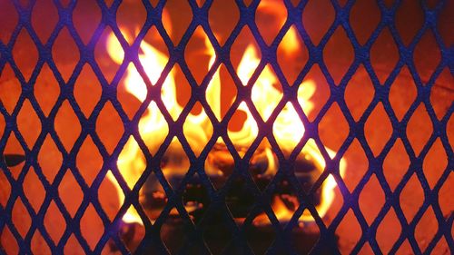 Chainlink fence seen through chainlink fence