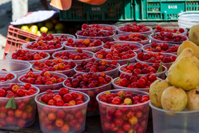 Cherries for sale at the sao joaquim fair, city of salvador, bahia.