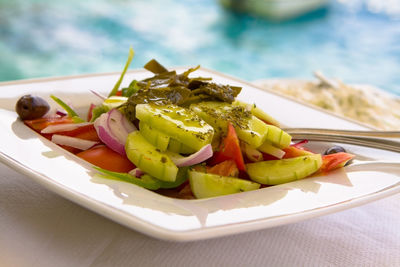 Close-up of fruits in plate on table