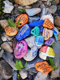 High angle view of multi colored stones on pebbles