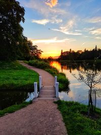 Scenic view of lake against sky during sunset