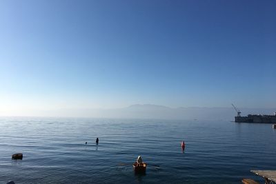 Scenic view of sea against clear blue sky