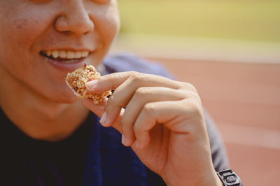 Close-up of woman eating ice cream