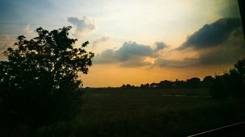 Scenic view of landscape at sunset