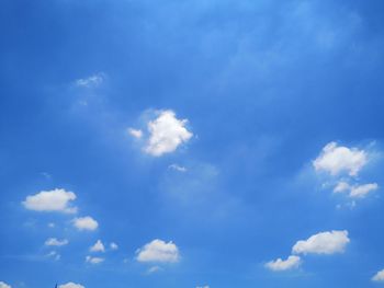 Low angle view of clouds in blue sky