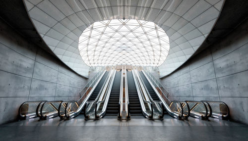 Low angle view of escalator in building