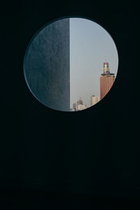 Silhouette buildings against clear sky