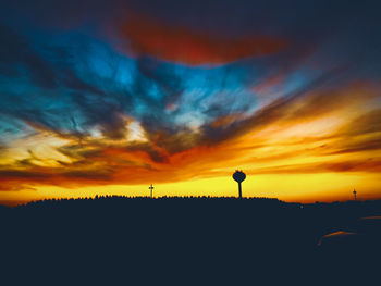 Scenic view of dramatic sky during sunset