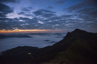 Scenic view of sea against sky at night